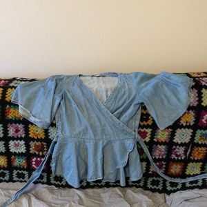 Adorable, tencel material flutter sleeve wrap top